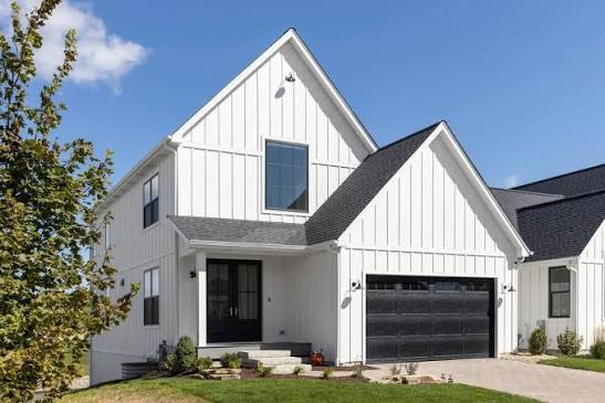 White home with vertical board-and-batten siding