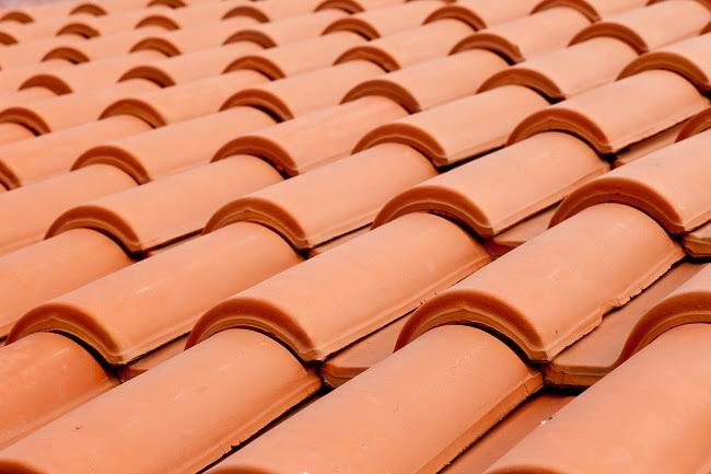 Close view of new terracotta barrel roof tiles