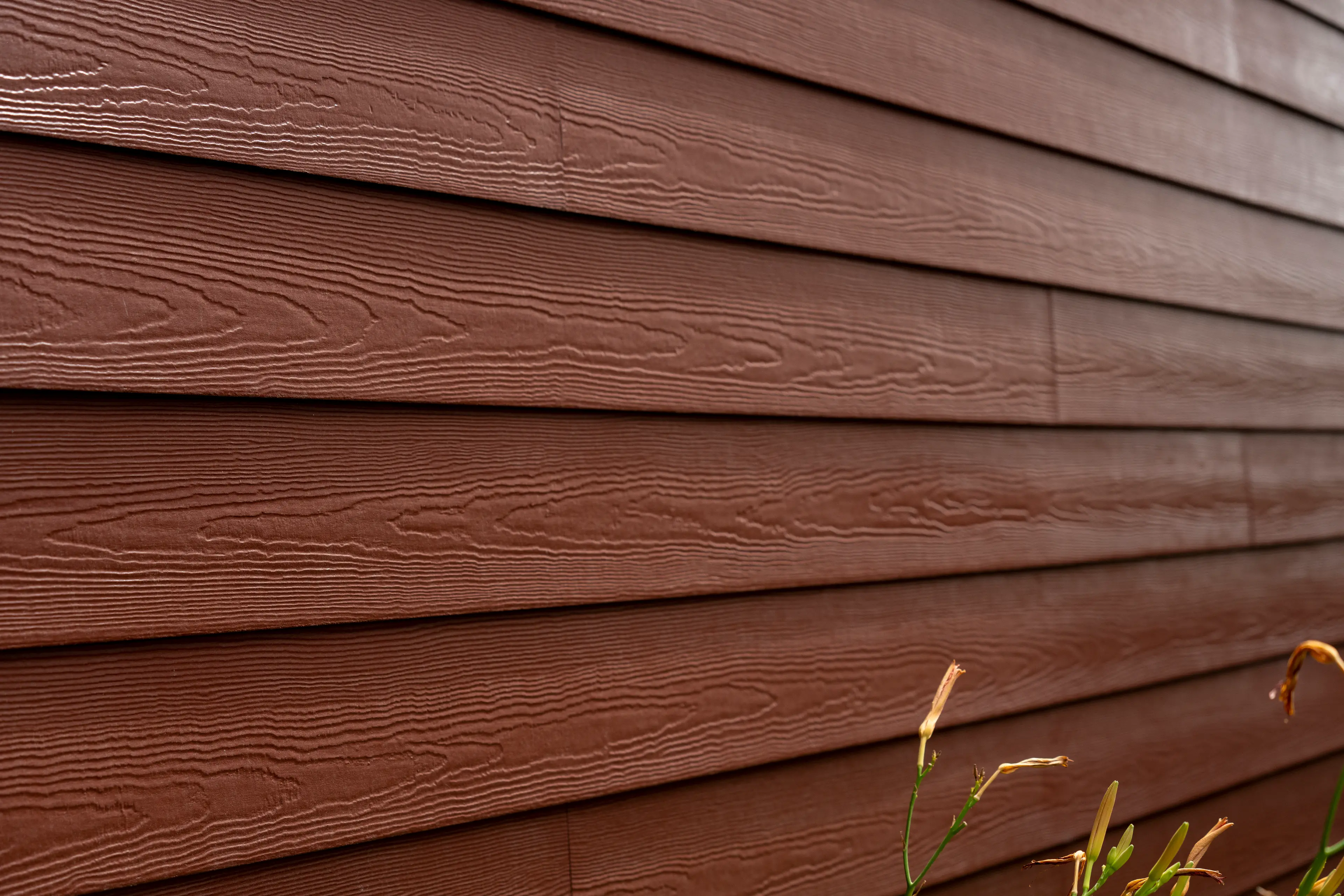 Wood-grain fiber-cement lap siding