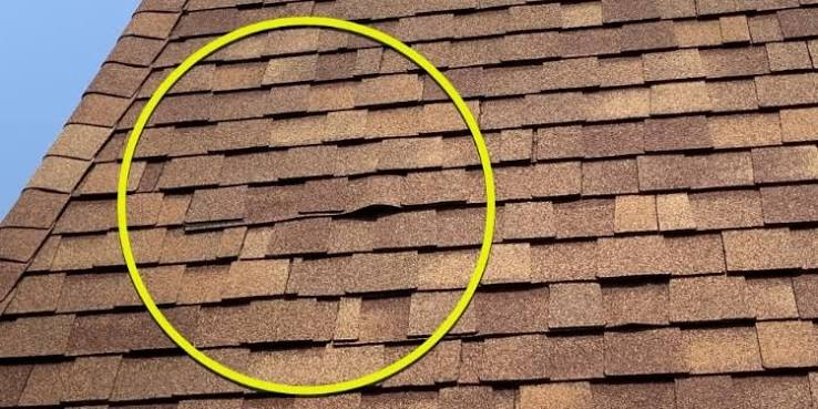 Lifted and displaced pieces within a roof course